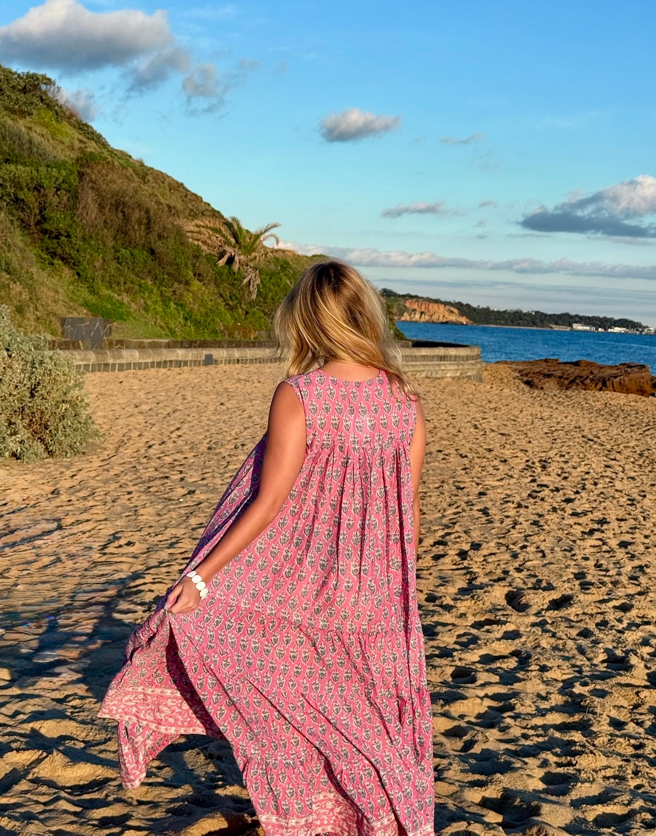 She Left Flowers by the Shore