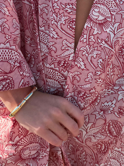 Rosé Resort cotton mini dress worn outdoors in natural light